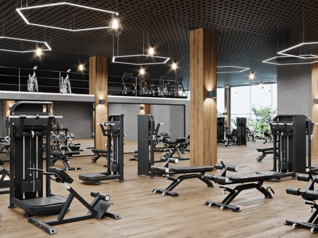 A well-equipped gym room with a range of exercise equipment for a complete workout.